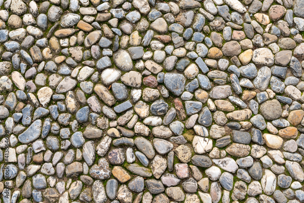 top down view of packed pebble pavement background top down view of packed pebble pavement background