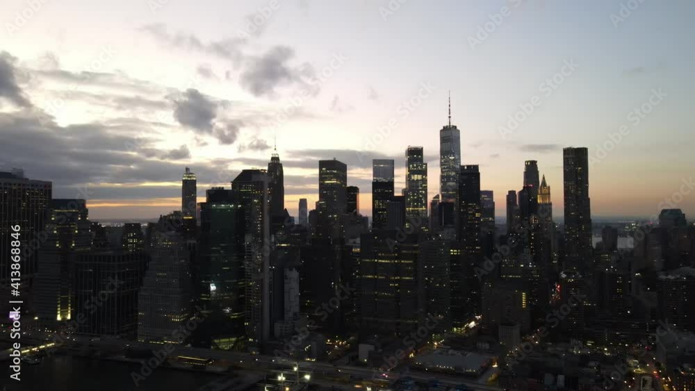 new york city nightscape reviling shot from water drone shot in sunset horizon new york city nightscape reviling shot from water drone shot in sunset horizon