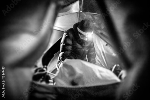 A person working within the tent