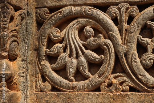 Ancient times historical motifs at somnathpura temple india photo