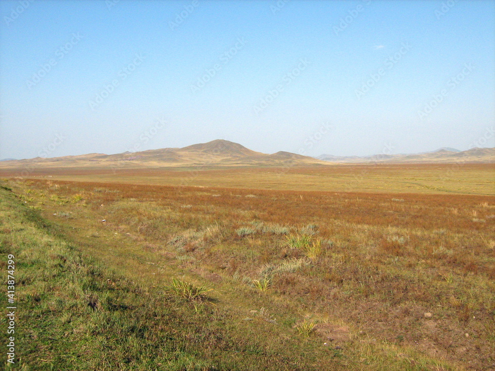 autumn steppes and hills of Khakasia, stormy sky