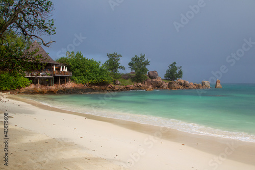 Tropical beach with granite rocks on Praslin, Seychelles.