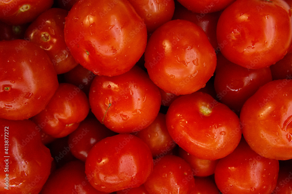 Washed red fresh tomatoes close-up Washed red fresh tomatoes close-up