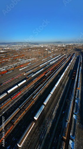 marshalling yard for railway cargo trains in Budapest. This is on Ferencvaros district. Aerial photo about lot empty and full trains. photo
