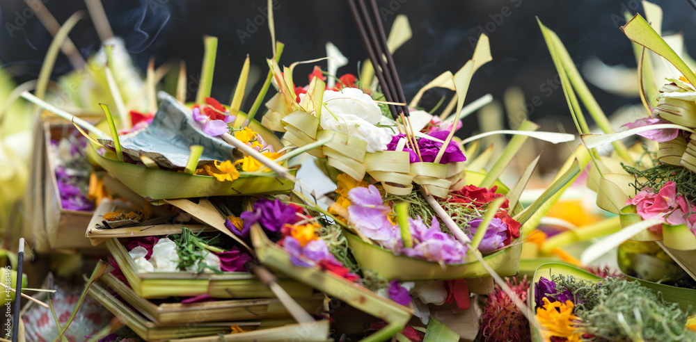 Balinese offerings with flowers and money Balinese offerings with flowers and money