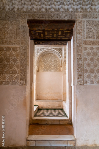 view of detailed and ornate Moorish and Arabic decoration in the arched doorways of the Nazaries Palace of the Nazaries Palace photo