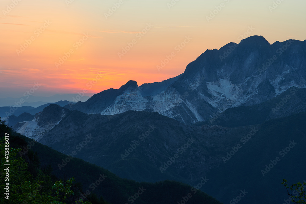 Picturesque mountains with blue bloom in soft light of sun Picturesque mountains with blue bloom in soft light of sun