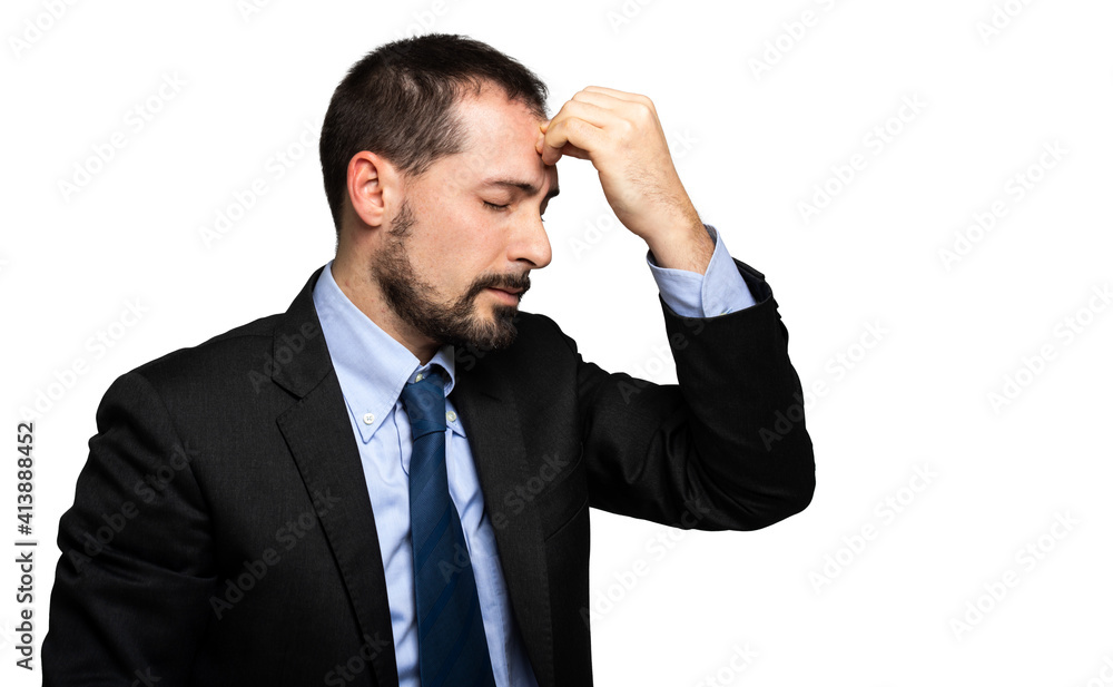 Young businessman in a thoughtful and stressed expression Young businessman in a thoughtful and stressed expression