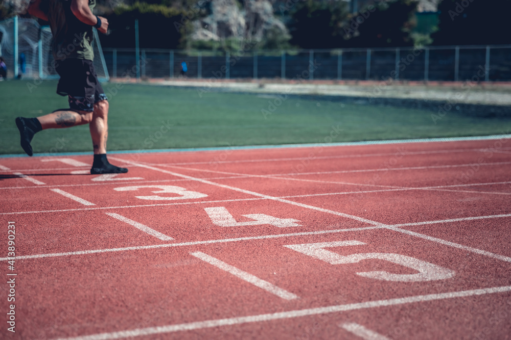 Person running on the track