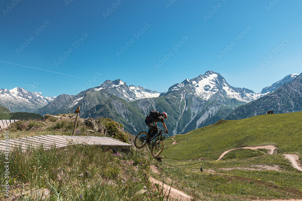 Mountain bike drop in downhill slope, les 2 alpes, Ecrins, Oisans, France