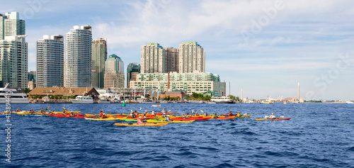 Photography Kayakers in Lake Ontario with Toronto skyline in the background, Canada