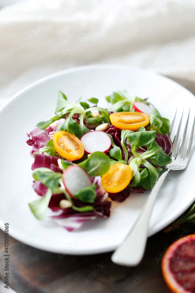 High angle view of salad served in plate on cutting board High angle view of salad served in plate on cutting board