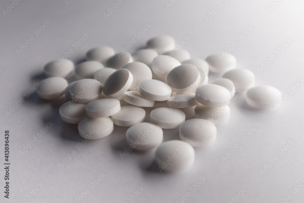 Medical tablets spread on the table Medical tablets spread on the table