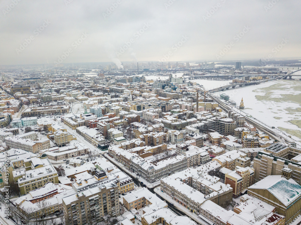 Obraz premium Snowy Kiev. Aerial drone view. Winter snowy morning.