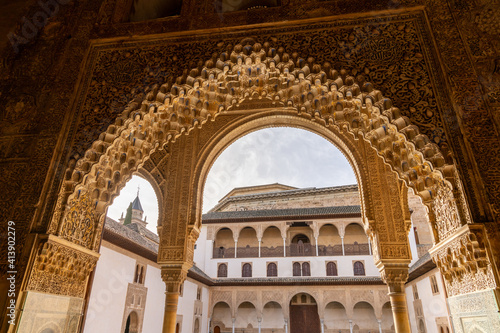view of detailed and ornate Moorish and Arabic decoration in the arched doorways of the Nazaries Palace