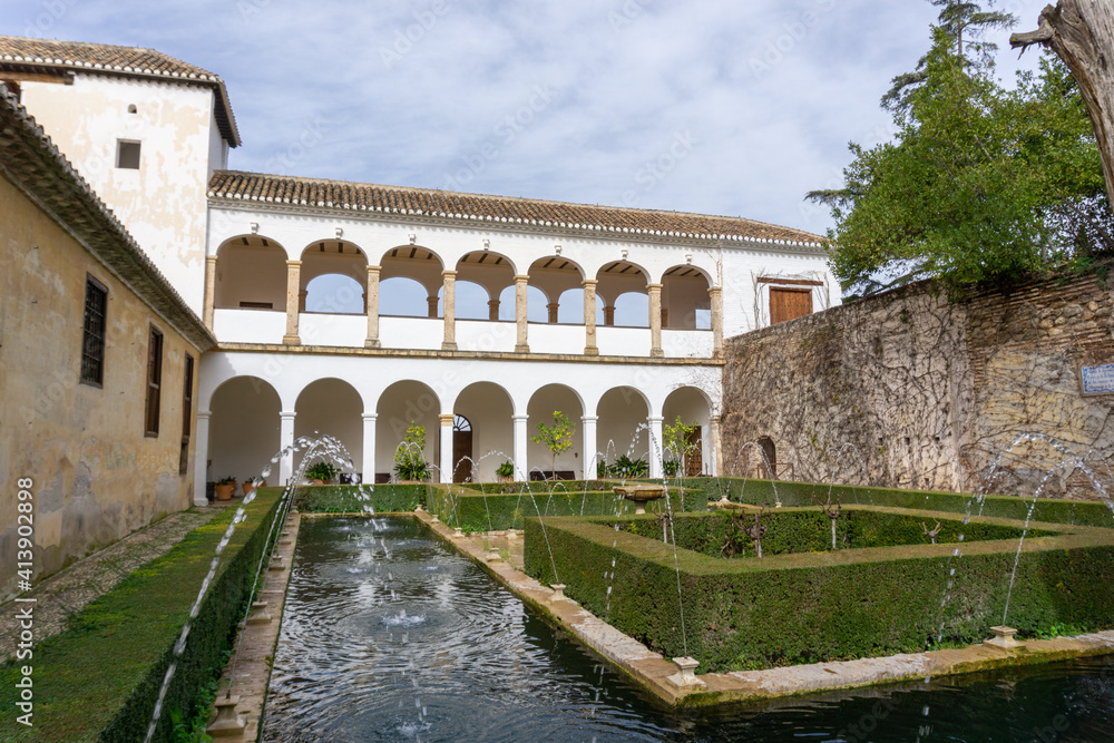 view of the Generalife Palace and grounds in the Alhambra Palace complex above Granada