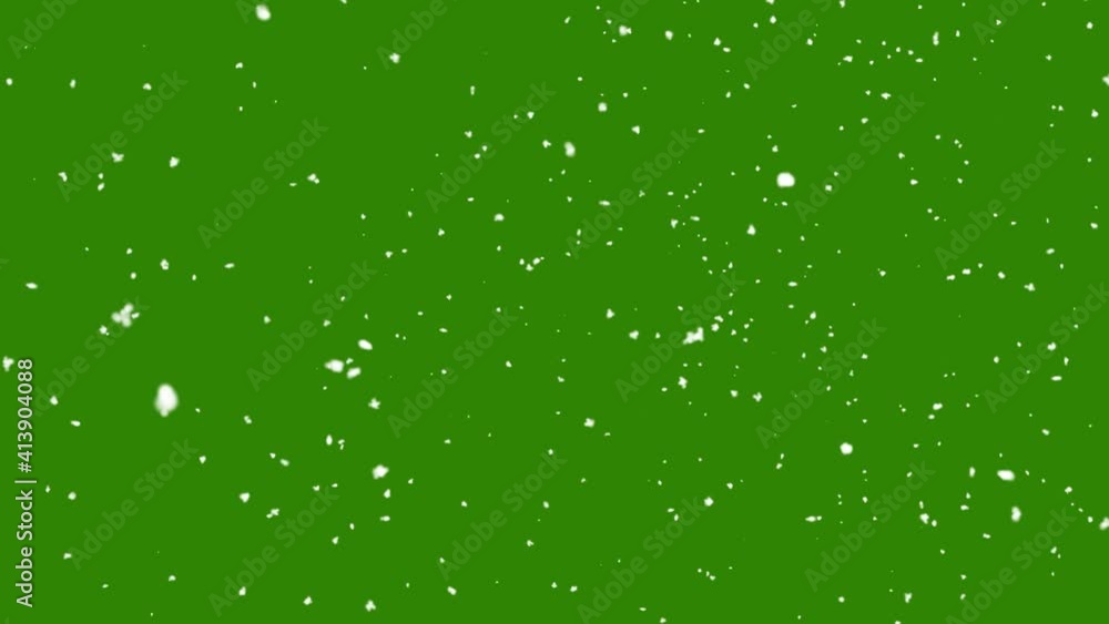 Snow falling on green background Snow falling on green background
