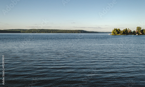Lake landscape with ripples on water, relaxing view