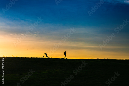 Silhouette walk at Sunset © emilyskeels