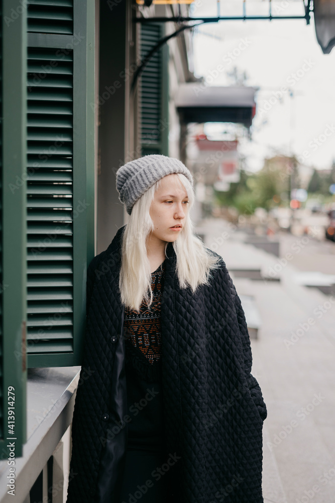 portrait young beautiful blonde girl standing on the street portrait young beautiful blonde girl standing on the street