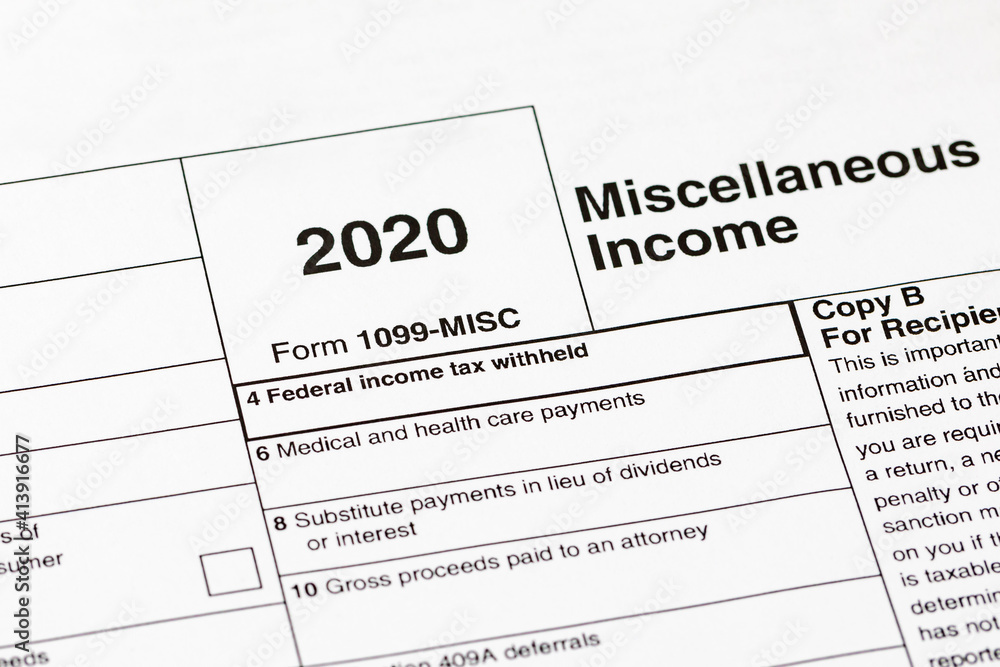 1099 miscellaneous income tax form. Concept of income taxes and federal tax information. 1099 miscellaneous income tax form. Concept of income taxes and federal tax information.