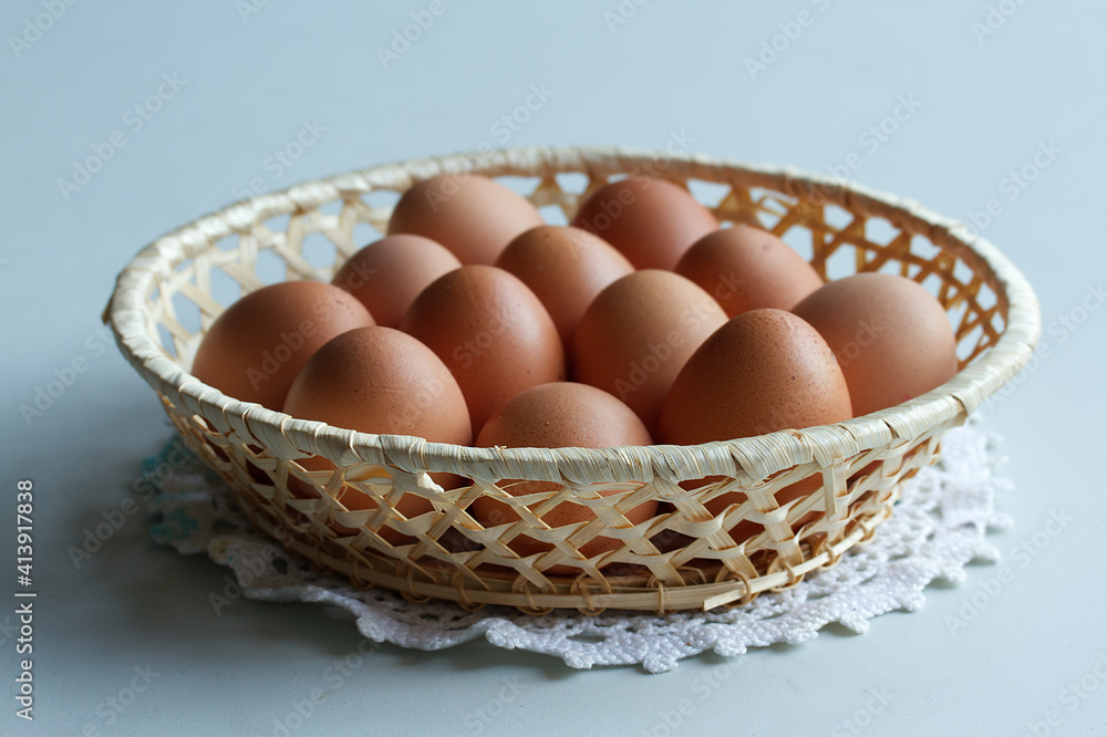 basket with brown eggs. basket with brown eggs.