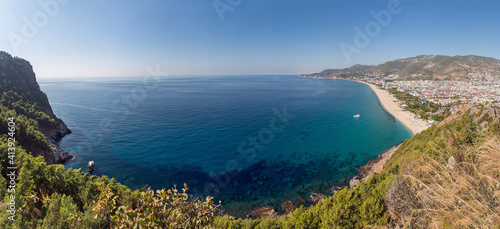 View from above to the Kleopatra beach and Mediterranian sea in Alanya, Turkey. Holiday season concept.