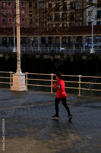 Girl running in the street