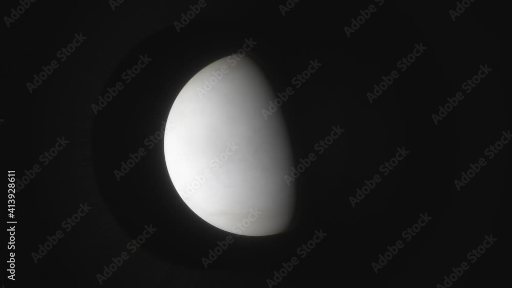 A distant view of the clouds and atmosphere of the Inner Planet, Venus, as it rotates around the sun A distant view of the clouds and atmosphere of the Inner Planet, Venus, as it rotates around the sun