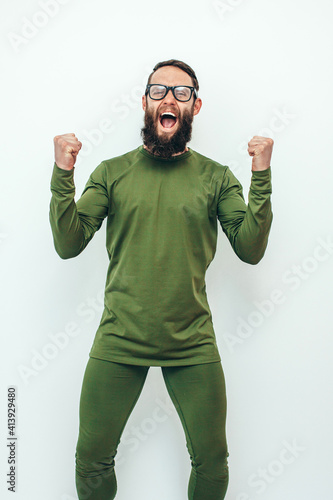 Portrait of handsome guy wearing thermal underwear isolated on white photo