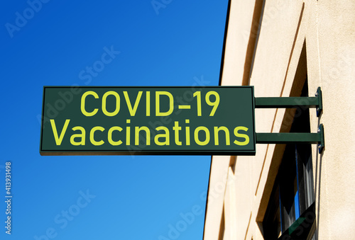 COVID-19 vaccination campaign material: Photo illustration indicates location for COVID-19 vaccinations. photo