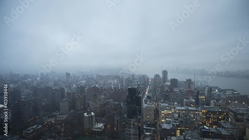 Wallpaper Mural Foggy lower Manhattan day from the air, timelapse - afternoon to the night Torontodigital.ca