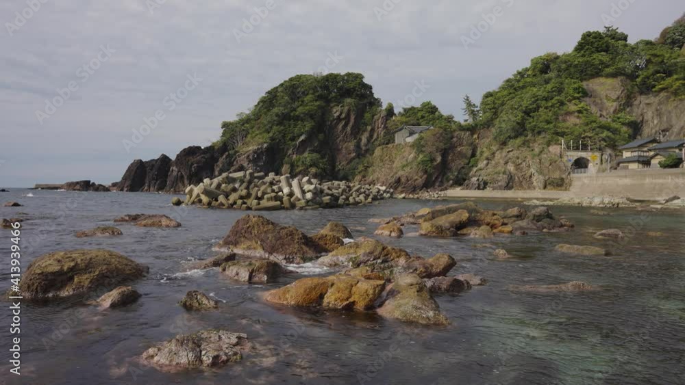 Echizen coast, Sea of Japan in Fukui Prefecture. Rock Pools and Waves in Slowmo Echizen coast, Sea of Japan in Fukui Prefecture. Rock Pools and Waves in Slowmo