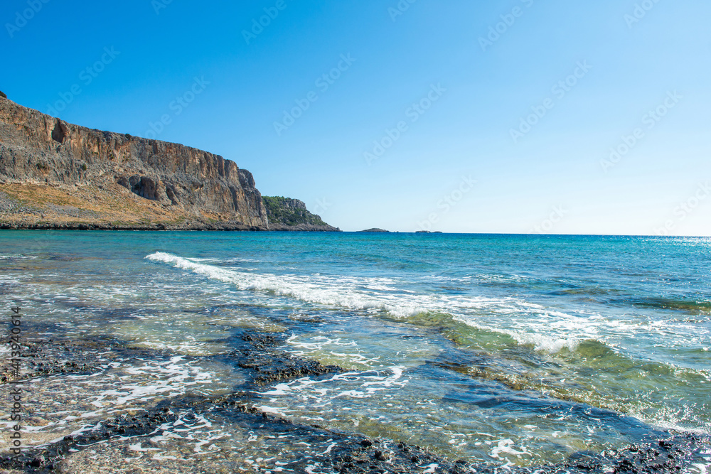 Beautiful rocky beach  on the shore of Mediterranean Sea