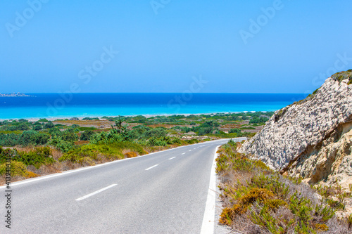 Road along the coast of the Aegean Sea on the island of Rhodes  Greece