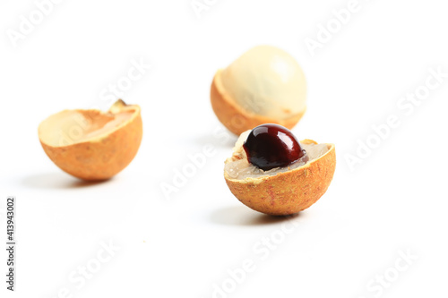 Lychee cut on white background photo