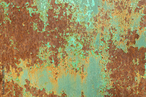 due to rust, most of the paint has peeled off the wall