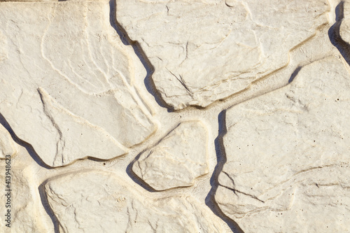 shallow cracks spread over stones