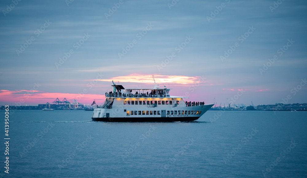 Ferry boat sunset landscape in the middle of the bay Ferry boat sunset landscape in the middle of the bay