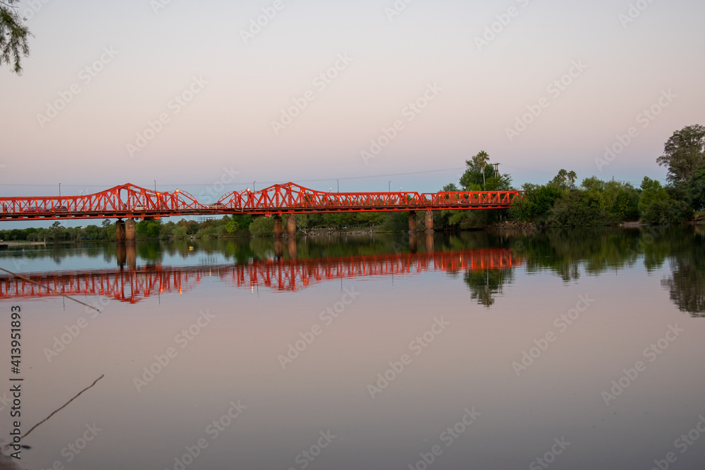 iron bridge over a river