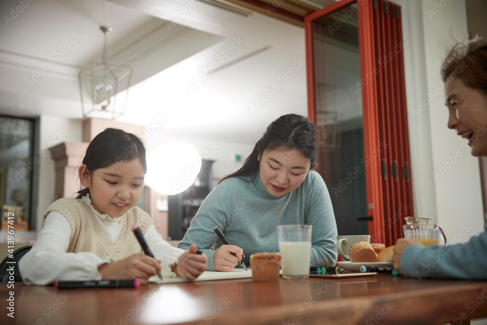 happy young female people eating croissant and drinking coffee and juice happy young female people eating croissant and drinking coffee and juice