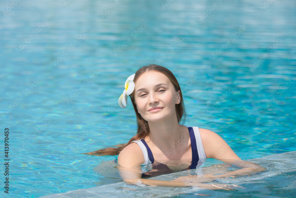Beauty women swimming in pool, Girl enjoying private at pool villa