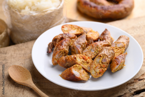 Northern Thai sausage (Sai Aua), Grilled intestine stuffed with minced pork, spices and herbs, popular food in Chiangmai, Thailand