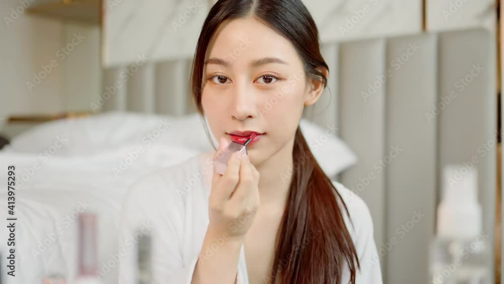 Happy attractive asian woman apply skincare cream on face and body.Female hand touch face and smooth applying cream and lotion for beauty perfect with wellness, skin care . Happy attractive asian woman apply skincare cream on face and body.Female hand touch face and smooth applying cream and lotion for beauty perfect with wellness, skin care .