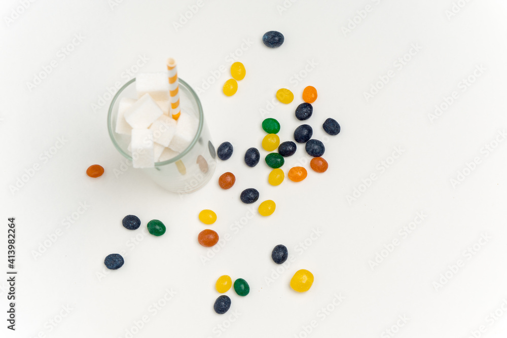 glass with sugar with a straw candy dragee sweets calories glass with sugar with a straw candy dragee sweets calories