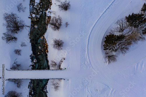 small river in ice and snow  photo