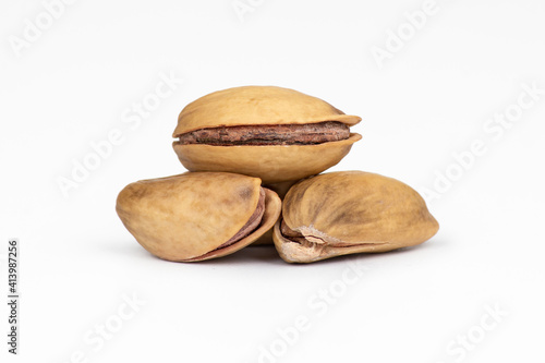 Pistachio nuts isolated on white background
