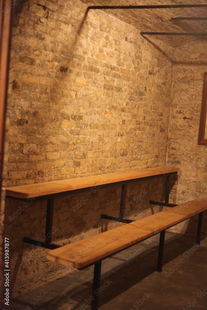 old wooden table and chair, BRICK WALL