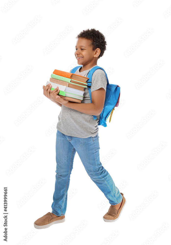 Little African-American schoolboy with books on white background Little African-American schoolboy with books on white background
