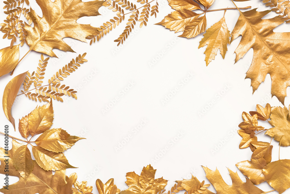Frame made of golden leaves on white background Frame made of golden leaves on white background